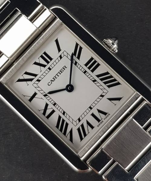 Cartier Tank Solo 3169 27mm Very Good condition stahl steel CL19OttAtt